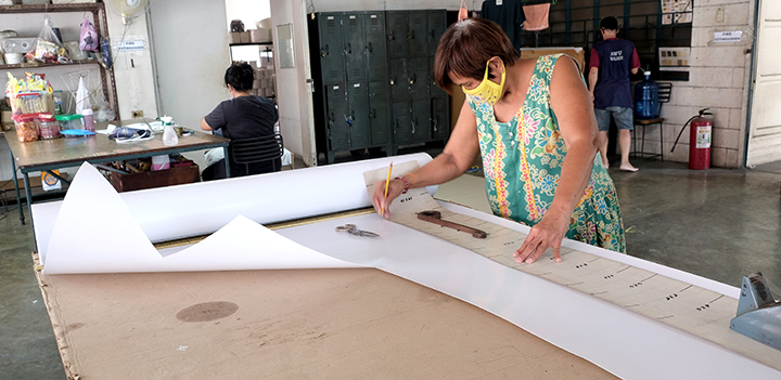 shade polystyrene backing being cut